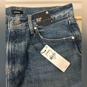 NWT size 4 70s flare mid rise jeans with fray